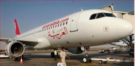 Air Arabia aircraft on the runway at Thiruvananthapuram airport.